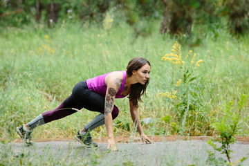 Fototapeta premium Fitness woman training and jogging in summer park near forest. R
