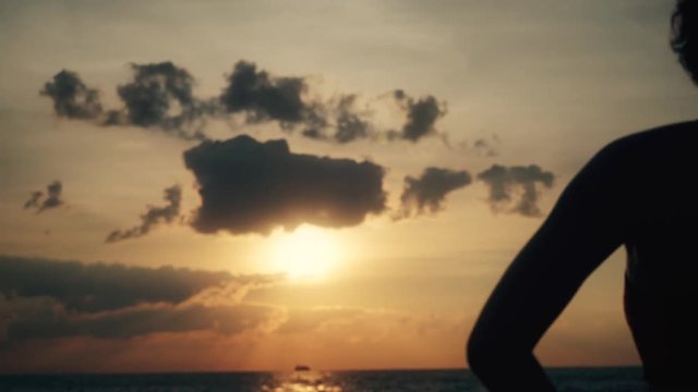 Runner athlete sitting at seaside