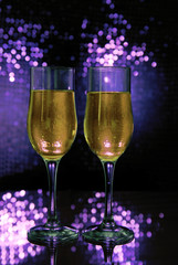 Two glass of wine with violet boken
