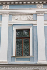 Fototapeta na wymiar Window of a historic building in the classical style. Kiev, Ukra