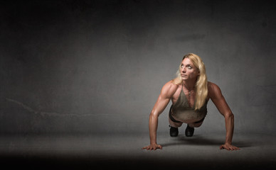 Fototapeta na wymiar push up for athletic woman