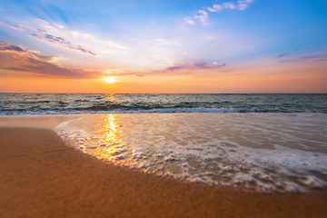 Colorful ocean beach sunrise.