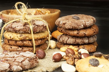 Mixed Cookies on wooden table. Homemade biscuits for breakfast. Food preparation.
