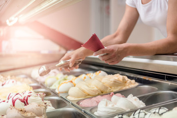 Woman serving ice cream