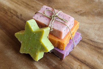 Various natural soaps on wood