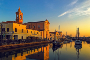 Obraz premium Cesenatico fishing harbor at scenic sunset designed by Leonardo da Vinci. Italy