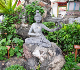 Anchorite stone statue at Wat Pho