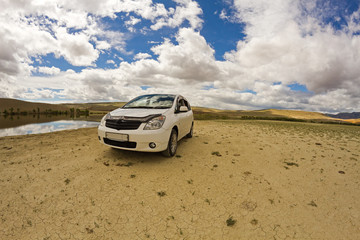 Fototapeta na wymiar Desert landscape car