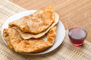 Hot cheburek and wine