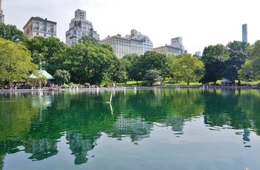 Fototapeta premium Scenic view of Central Park with New York buildings in the background