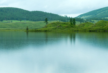 Fototapeta na wymiar Lake rain hills