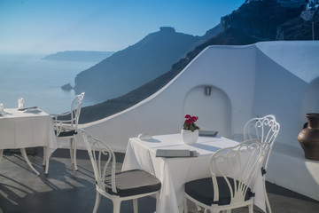 white table in outdoor restaurant in Greece, Santorini