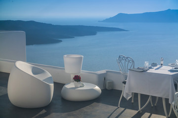 white table in outdoor restaurant in Greece, Santorini
