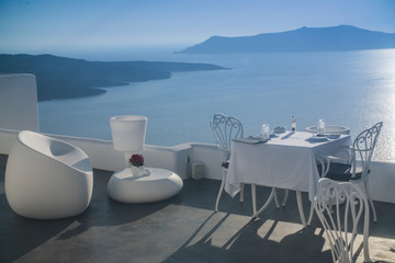 white table in outdoor restaurant in Greece, Santorini