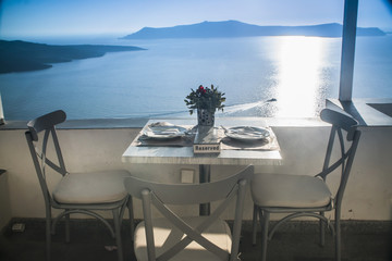 white table in outdoor restaurant in Greece, Santorini