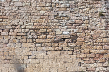 Antique street wall from bricks in Italy