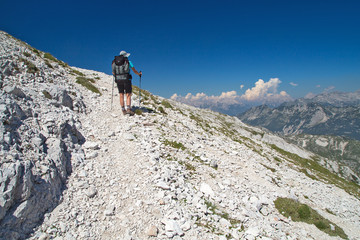 Mountaineer on the march to the mountain Peski, Mountain Krn, Julian Alps, Slovenia