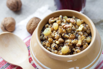 Kutia - sweet grain pudding, the traditional first dish of Christmas Eve supper served in Eastern European countries
