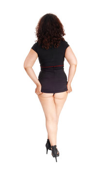 Woman showing her buttock.