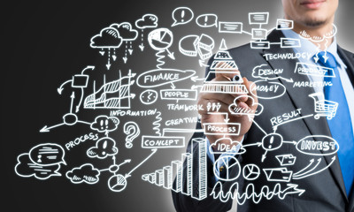 Man sketching business ideas 