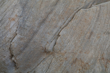 Rock with stripes and crack