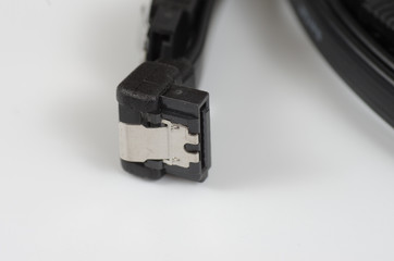 SATA cable on white background.