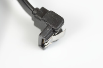 SATA cable on white background.