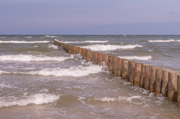 Wooden breakwater on stormy day - Baltic seascape, Poland