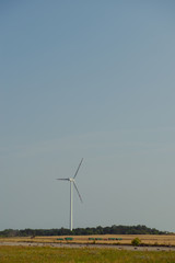 Fototapeta na wymiar Windturbine at sunny day