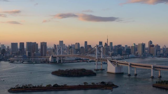 Tokyo, Japan skyline time lapse over the bay from day to night.