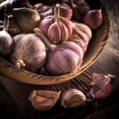 garlic bulb on rustic wooden background