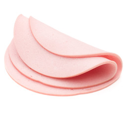 cooked boiled ham sausage or rolled bologna slices isolated on w