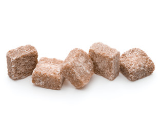 Brown lump cane sugar cube isolated on white background cutout