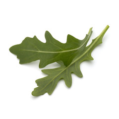 Fototapeta premium Sweet rucola salad or rocket lettuce leaves isolated on white ba