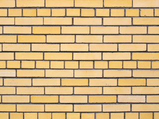 Texture of the yellow brickwork