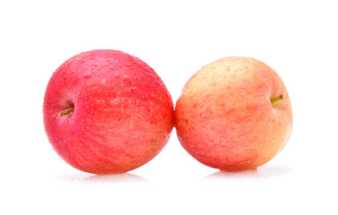 Ripe apple with water drop isolated on white background