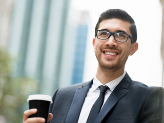 Portrait of handsome businessman outdoor