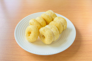 Donut bread on wooden table