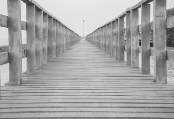 Wooden bridge in black and white.