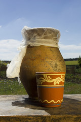 Clay jug with milk