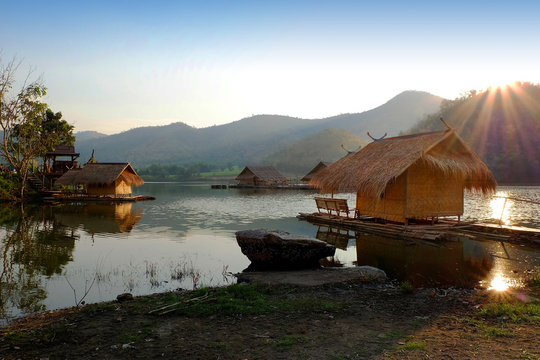 the lagoon with mountain background at khao wong reservoir Suphanburi province Thailand with sunset light in the evening 