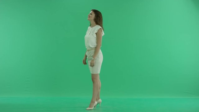 smiling woman on green screen