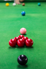 Snooker balls on snooker table.