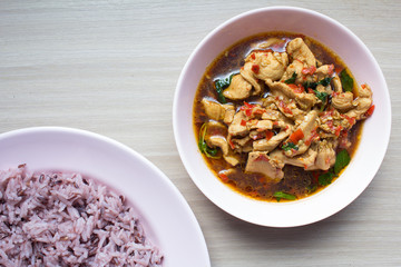Black rice Spicy fried chicken with basil leaves