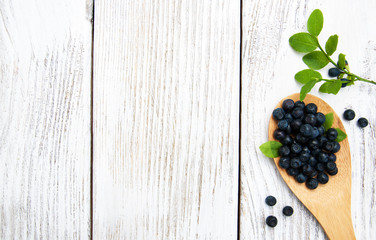 Blueberries on a old wooden background