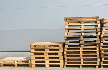 Pallets next to a warehouse