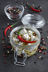 Feta cheese marinated in olive oil with spices © viktoriya89