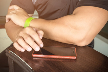 Man using smartphone for play game or online social network