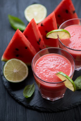 Closeup of glasses with freshly made cold watermelon smoothie