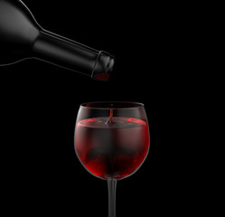 Red wine pouring on black background